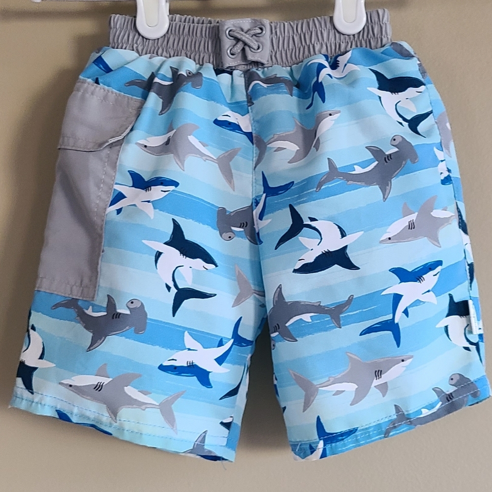 Light grey and blue swim trunks with built in diaper